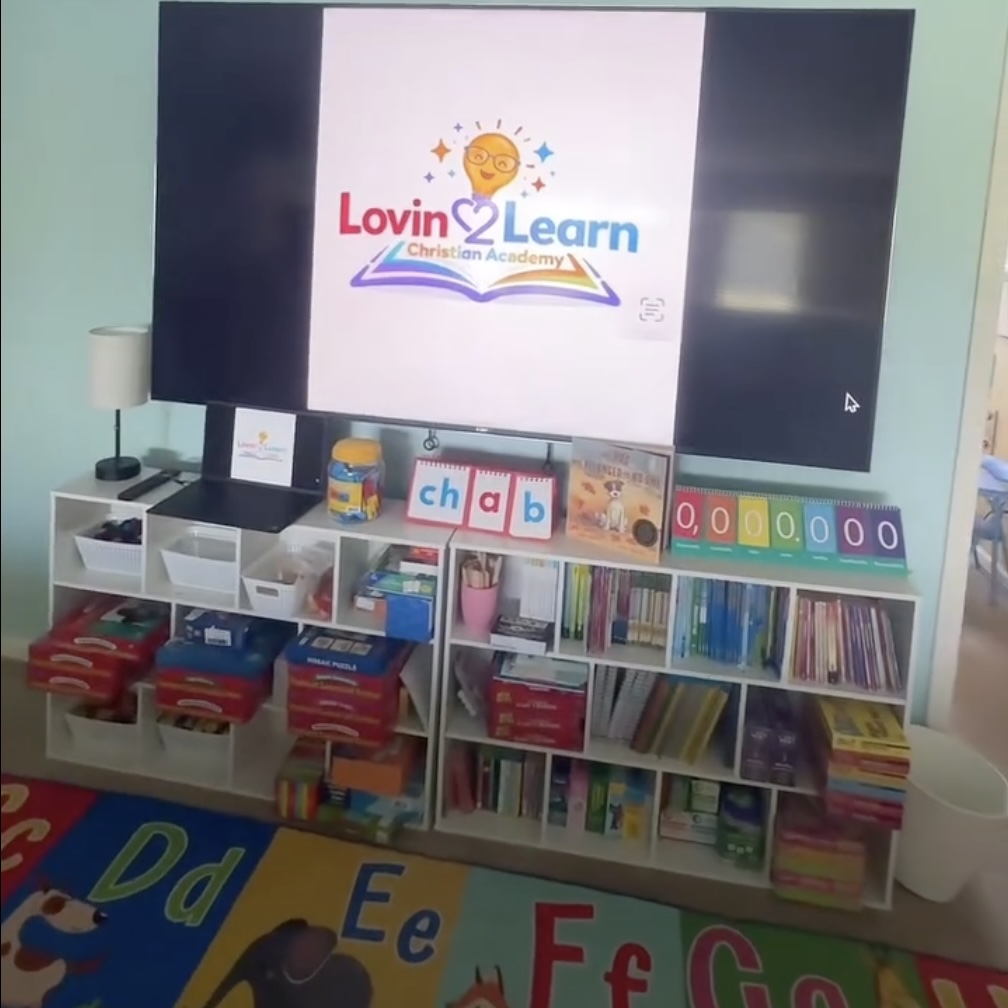 Children participating in a classroom activity at Lovin2Learn Christian Academy